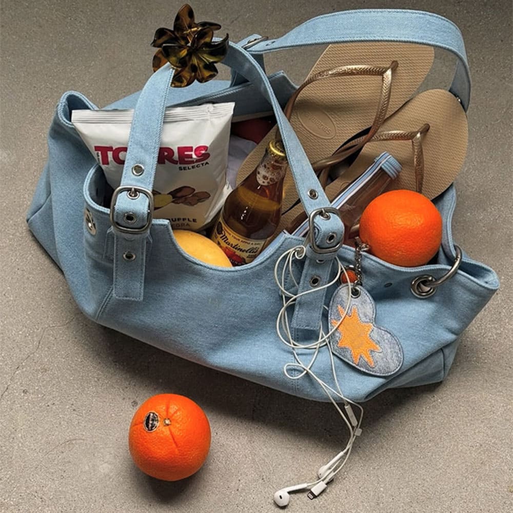 Icon Behavior Grommet Shoulder Bag