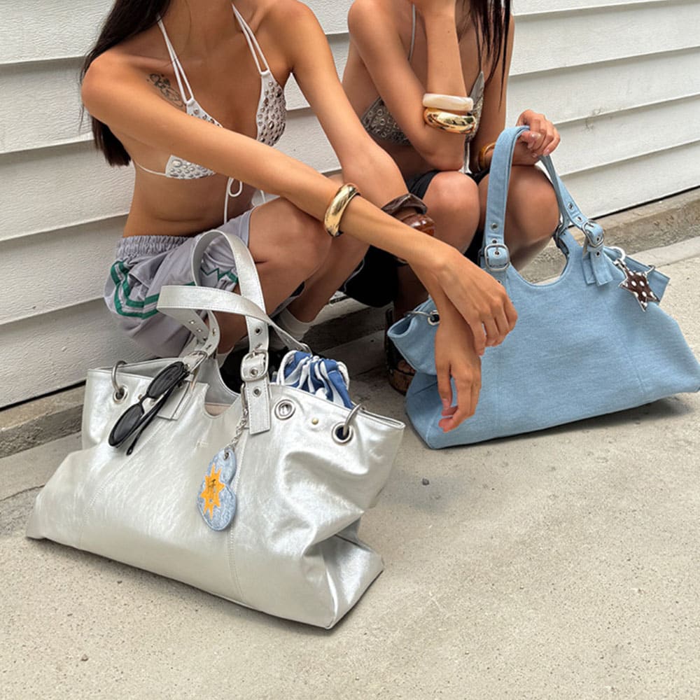 Icon Behavior Grommet Shoulder Bag