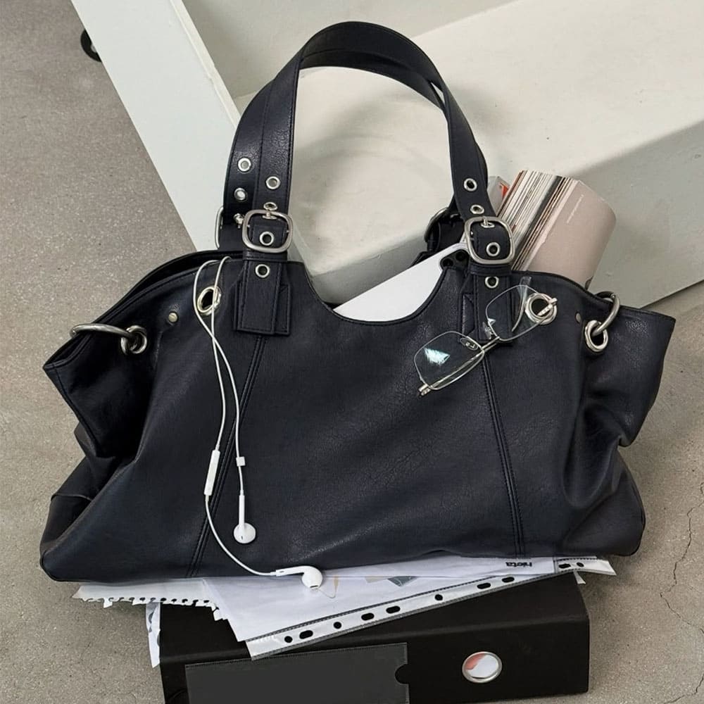 Icon Behavior Grommet Shoulder Bag